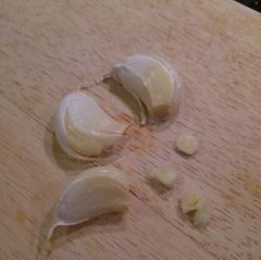hit garlic cloves with ends off